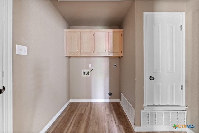 laundry room featuring visible vents, hookup for a washing machine, wood finished floors, and hookup for an electric dryer