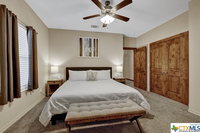 bedroom featuring a closet, carpet flooring, and ceiling fan