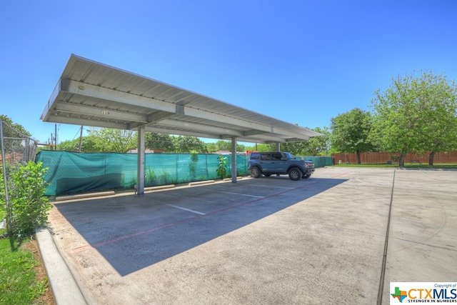 view of car parking featuring a carport