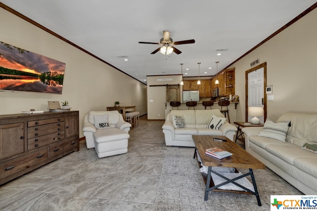 living room with ceiling fan and ornamental molding