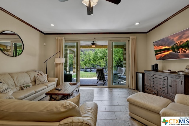 living room featuring ceiling fan and crown molding