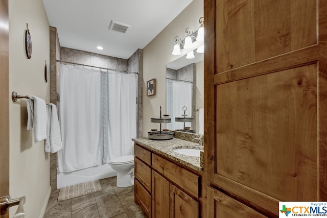 full bathroom with vanity, toilet, and shower / tub combo with curtain