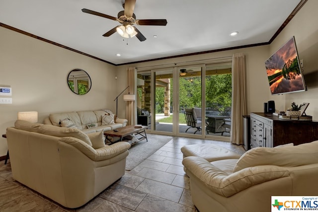 living room featuring ceiling fan and crown molding