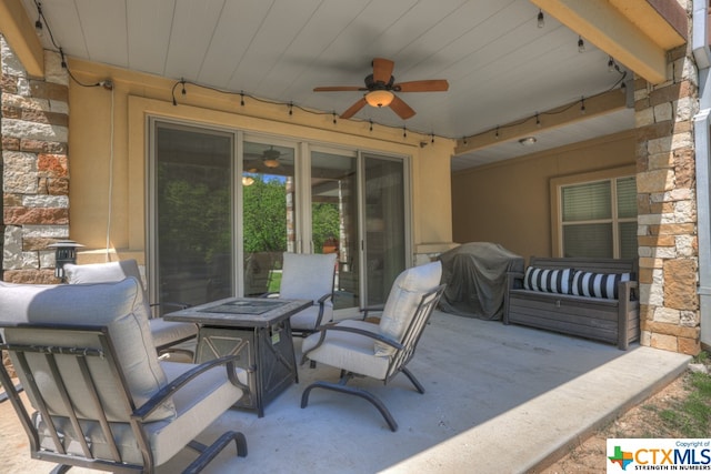 view of patio / terrace featuring area for grilling and ceiling fan