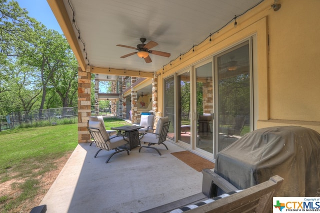 view of patio featuring ceiling fan and area for grilling