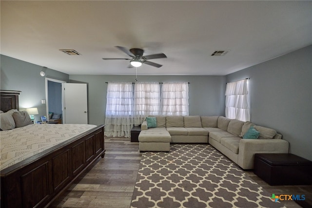 bedroom with hardwood / wood-style flooring and ceiling fan