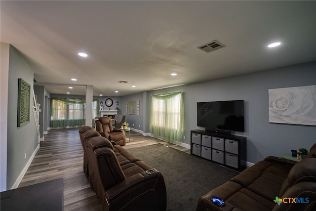 living room featuring dark hardwood / wood-style floors