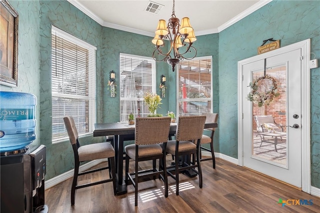 924 Queen Elizabeth Dr, Mcgregor, TX 76657 - dining room with visible vents, ornamental molding, an inviting chandelier, baseboards, and dark wood-style flooring