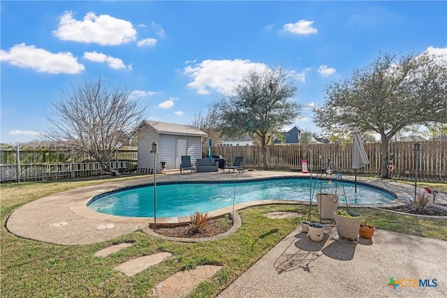 924 Queen Elizabeth Dr, Mcgregor, TX 76657 - view of swimming pool featuring an outdoor structure, a fenced backyard, a fenced in pool, and a patio