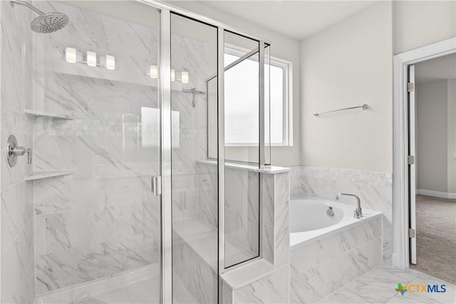 355 Victoria Peak Loop, Dripping Springs, TX 78620 - bathroom with a marble finish shower and a bath