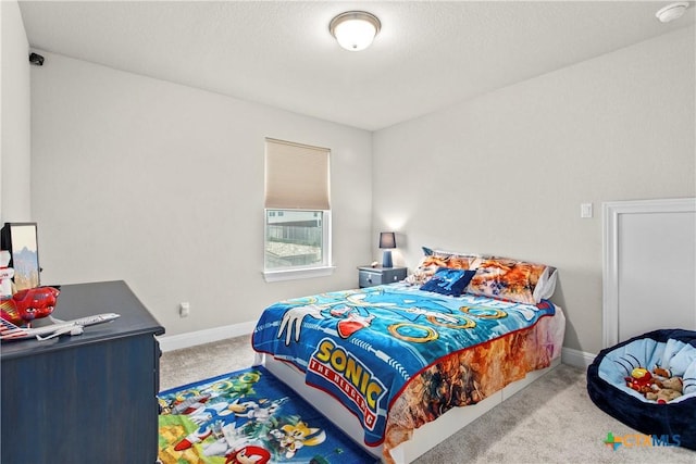 355 Victoria Peak Loop, Dripping Springs, TX 78620 - carpeted bedroom with baseboards