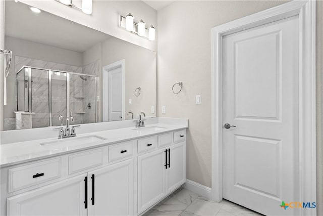 355 Victoria Peak Loop, Dripping Springs, TX 78620 - full bathroom with marble look tiles, a stall shower, double vanity, and baseboards
