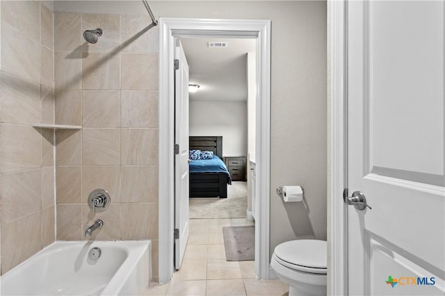 355 Victoria Peak Loop, Dripping Springs, TX 78620 - bathroom featuring tile patterned floors, shower / bath combination, and toilet