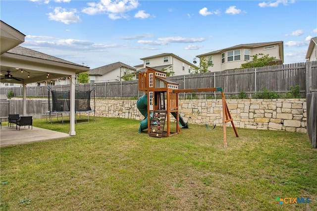 355 Victoria Peak Loop, Dripping Springs, TX 78620 - view of jungle gym with a trampoline, a patio, a ceiling fan, and a residential view