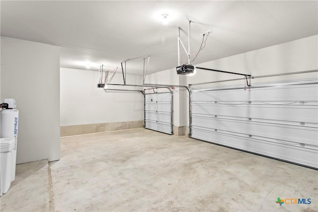 355 Victoria Peak Loop, Dripping Springs, TX 78620 - garage with a garage door opener