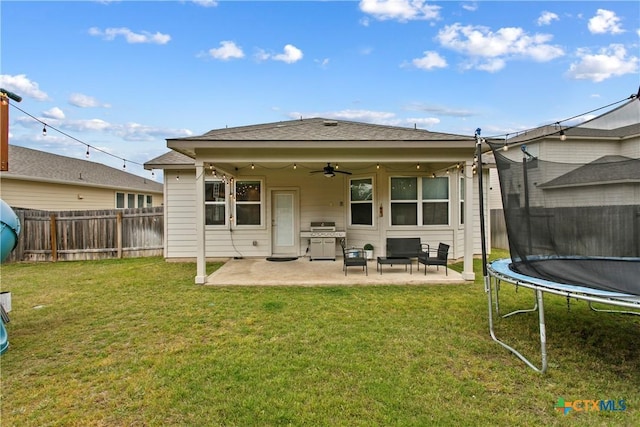355 Victoria Peak Loop, Dripping Springs, TX 78620 - rear view of property featuring a trampoline, a ceiling fan, and a patio area