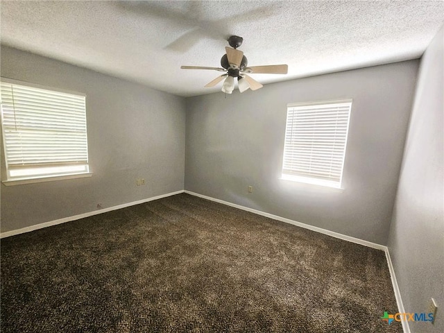 917 Edwards St, Copperas Cove, TX 76522 - spare room featuring dark carpet, a ceiling fan, and a textured ceiling