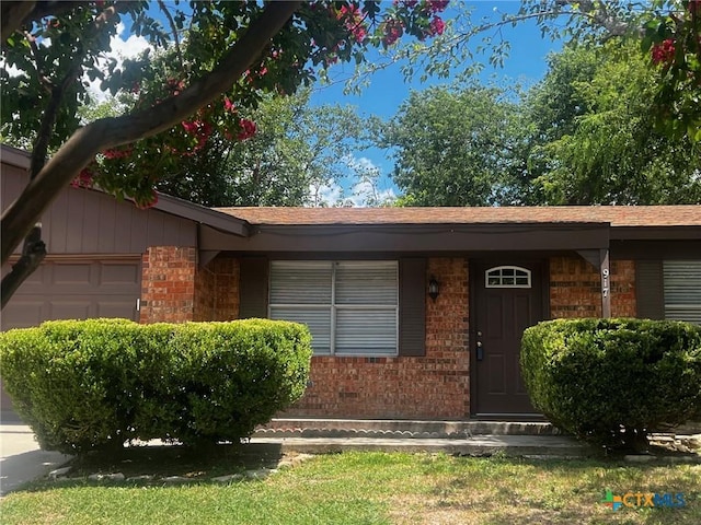 917 Edwards St, Copperas Cove, TX 76522 - ranch-style home featuring brick siding and a garage