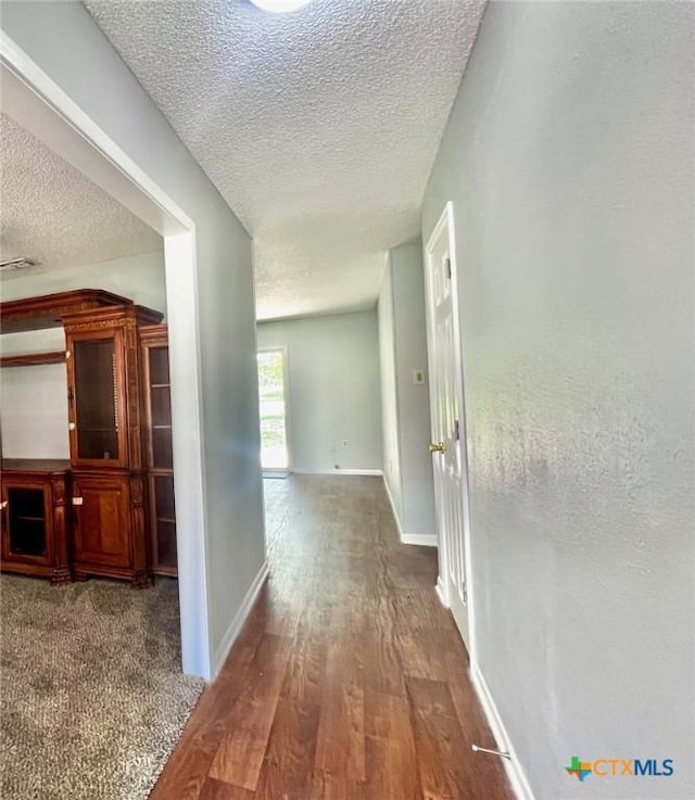917 Edwards St, Copperas Cove, TX 76522 - hall with a textured ceiling and wood finished floors