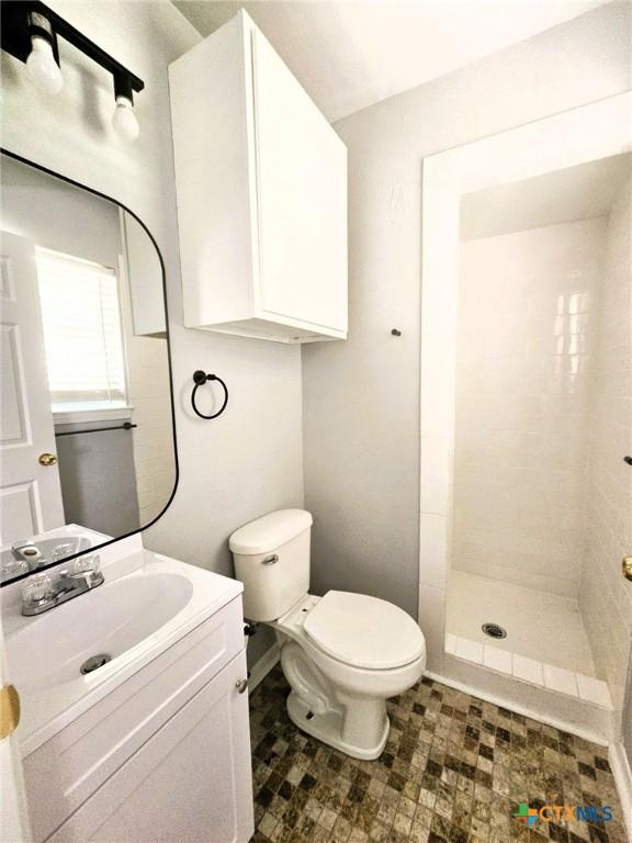 917 Edwards St, Copperas Cove, TX 76522 - full bath with a tile shower and vanity