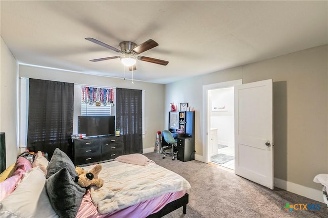 carpeted bedroom featuring connected bathroom and ceiling fan