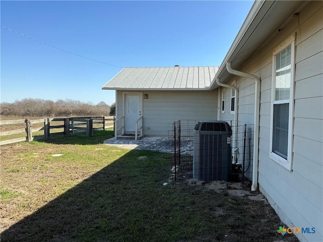 view of yard with central AC