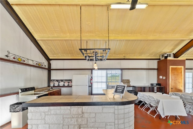 kitchen with white appliances, wood ceiling, and lofted ceiling