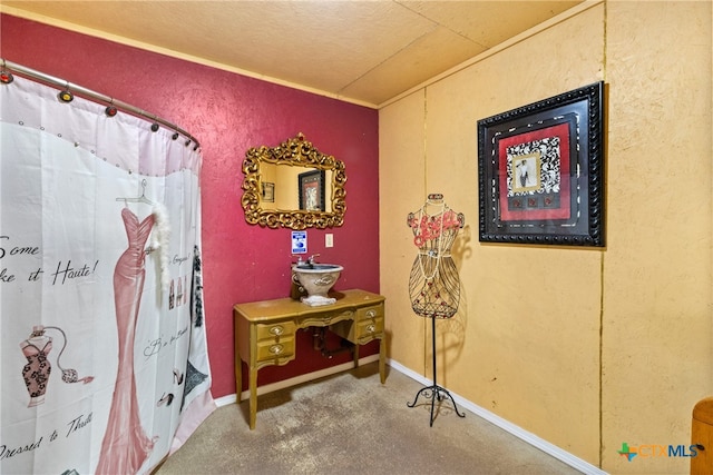 interior space featuring walk in shower and a textured ceiling