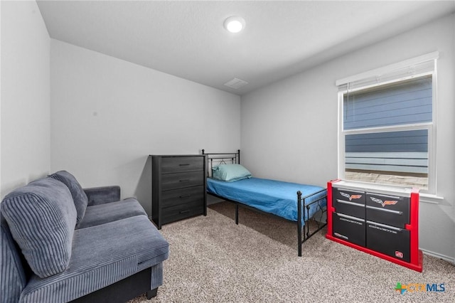 carpeted bedroom with visible vents