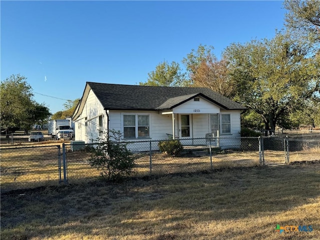 12101 Moffat Rd, Temple, TX 76502 - bungalow-style home with covered porch, a gate, and a shingled roof