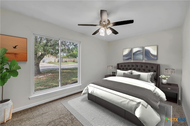 bedroom featuring ceiling fan and carpet floors