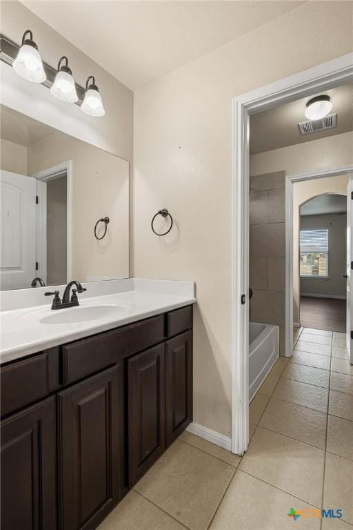 bathroom with vanity and tile patterned floors