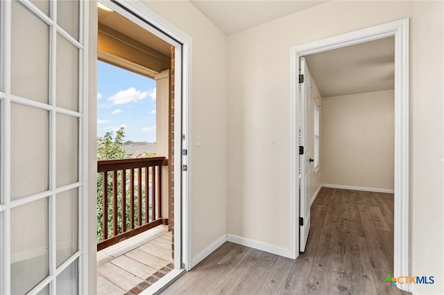 doorway to outside featuring light hardwood / wood-style floors