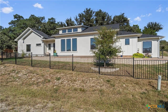 exterior space featuring a front lawn