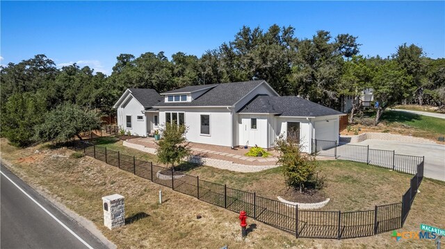 view of front of home with a front lawn