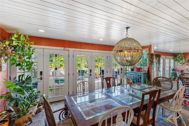 4842 W Fm 2147, Horseshoe Bay, TX 78657 - dining space with french doors, wooden ceiling, a chandelier, and stone finish flooring