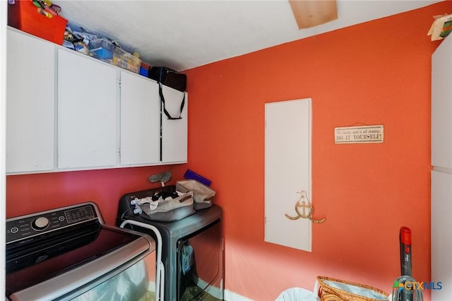 4842 W Fm 2147, Horseshoe Bay, TX 78657 - laundry room featuring cabinet space and washer and dryer