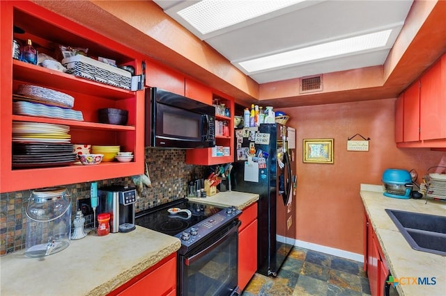 4842 W Fm 2147, Horseshoe Bay, TX 78657 - kitchen with black appliances, tasteful backsplash, open shelves, and light countertops