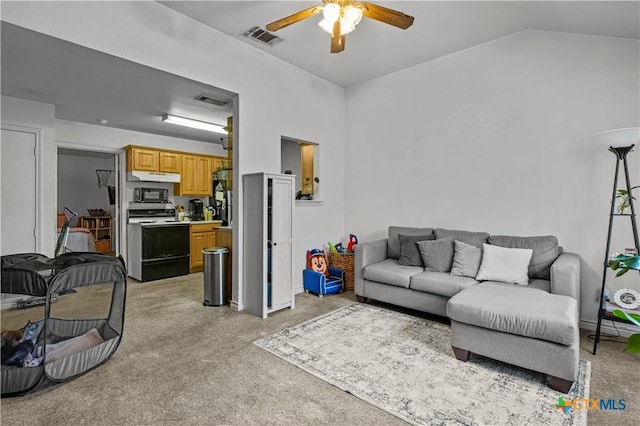 1104 S Terrace St, Temple, TX 76501 - living room featuring ceiling fan, light carpet, and vaulted ceiling