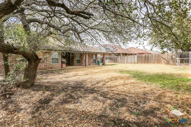 view of yard featuring fence