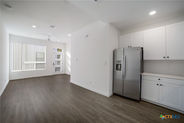 kitchen featuring dark hardwood / wood-style flooring, white cabinetry, stainless steel refrigerator with ice dispenser, and ceiling fan