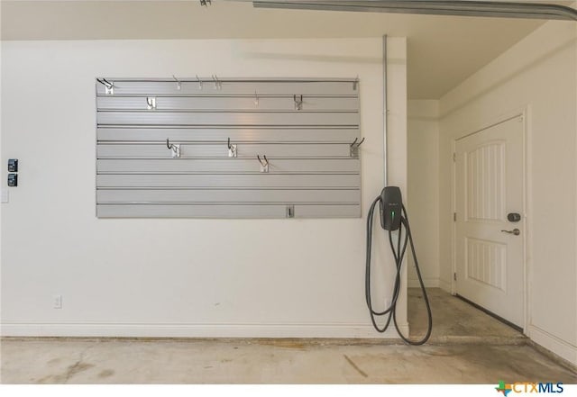 mudroom with concrete flooring