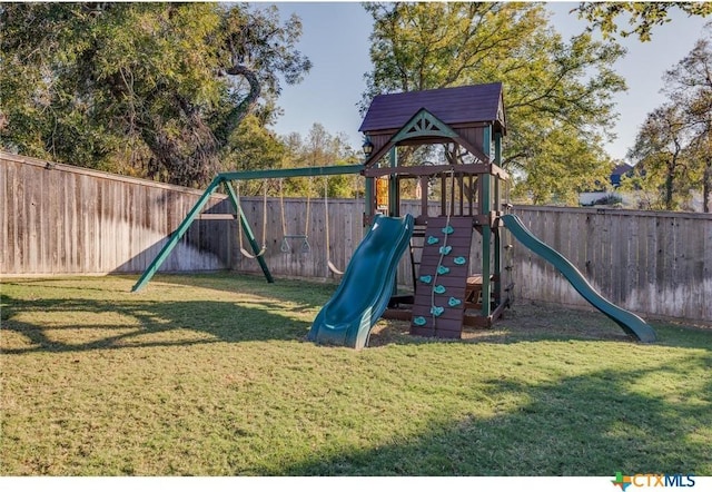 view of play area featuring a lawn