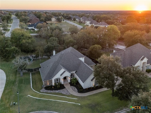 view of aerial view at dusk