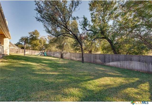 view of yard featuring a playground