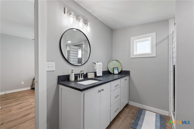 1113 W Port Dr, Port Mansfield, TX 78598 - bathroom featuring vanity and wood finished floors