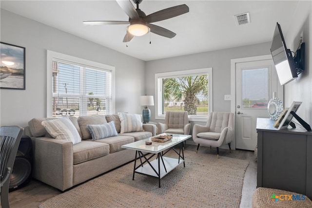 1113 W Port Dr, Port Mansfield, TX 78598 - living room with wood finished floors and a ceiling fan