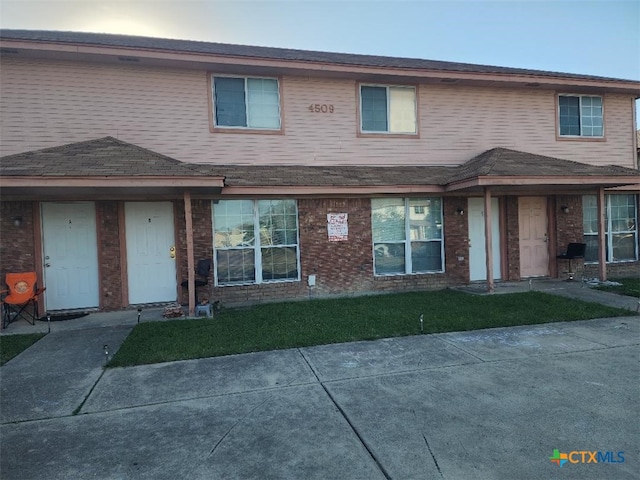 4509 Mattie Dr Unit A-D, Killeen, TX 76549 - view of front of home featuring brick siding and a front yard