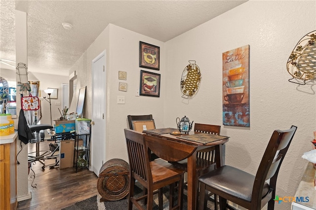 4509 Mattie Dr Unit A-D, Killeen, TX 76549 - dining room featuring wood finished floors, a textured ceiling, a desk, and a textured wall
