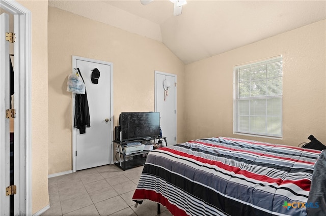 4509 Mattie Dr Unit A-D, Killeen, TX 76549 - bedroom with light tile patterned floors, vaulted ceiling, ceiling fan, and baseboards